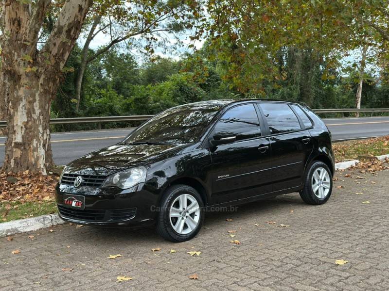 VOLKSWAGEN - POLO - 2012/2013 - Preta - R$ 43.900,00