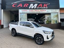 TOYOTA - HILUX - 2021/2021 - Branca - R$ 227.900,00